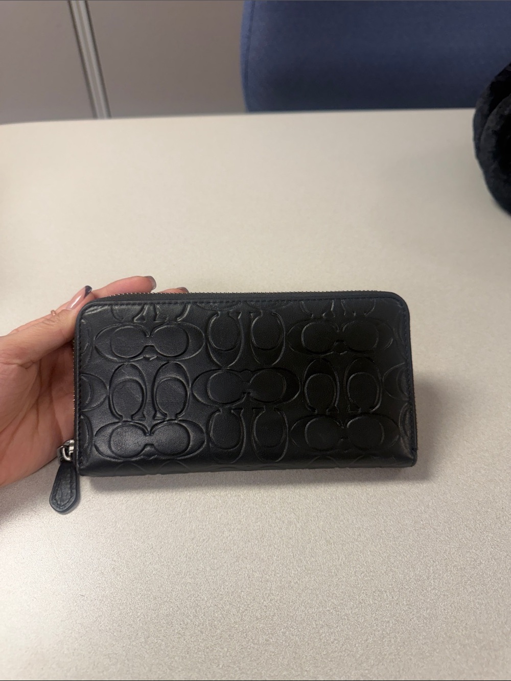 Like new Coach Black Embossed Leather Zip Wallet